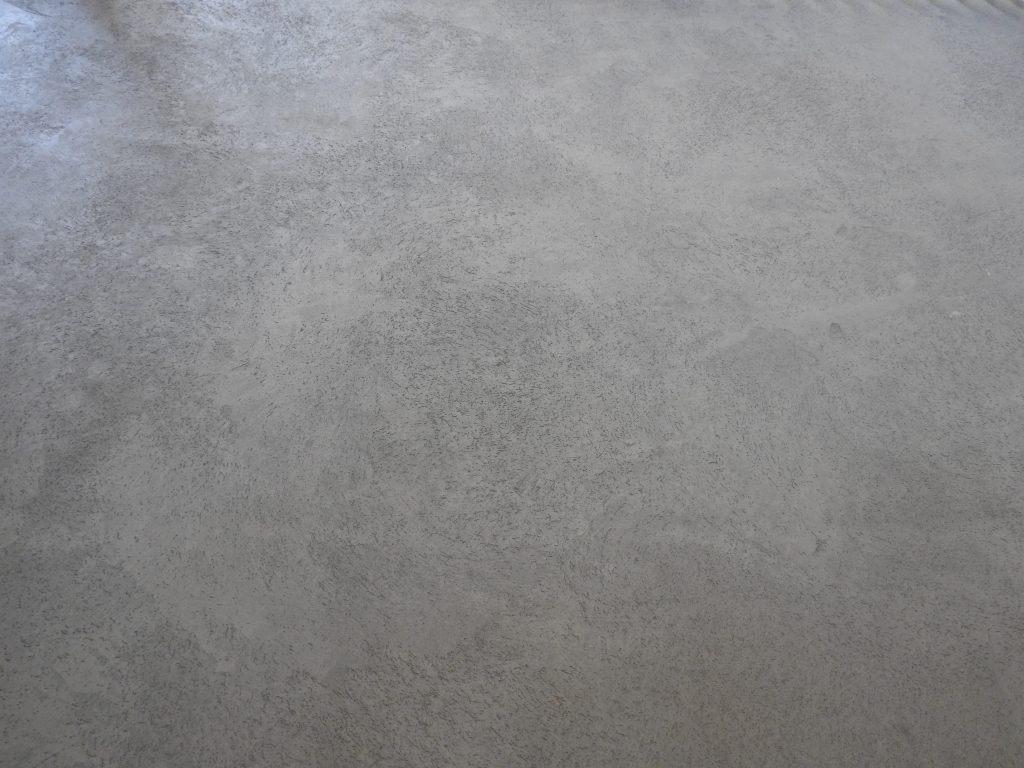 Woonkamer met Limestone Concrete van Boss Paints